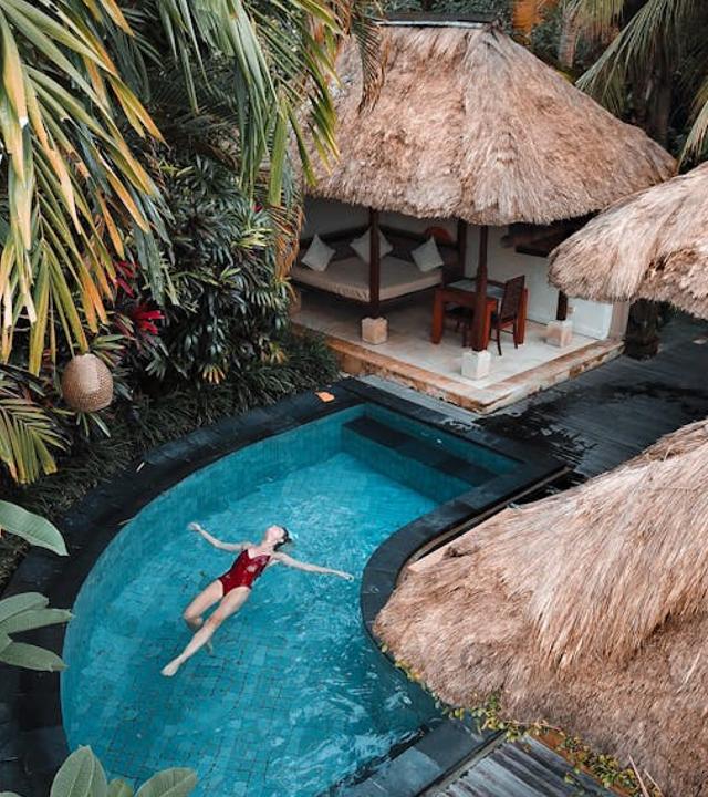A woman soaking on the swimming pool