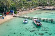 Yacht docked at pier;Photo credit: Pexels, Quang Nguyen Vinh